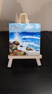 Olas rompiendo sobre rocas